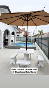 Bazén v ubytování Casa Lisa private pool at Silverlakes Batu Gajah #guestmuslim nebo v jeho okolí