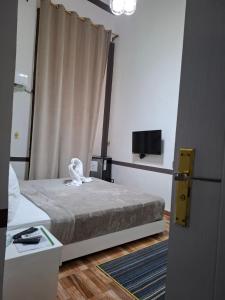 Voodi või voodid majutusasutuse Hotel velvet One toas