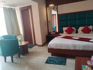 Postel nebo postele na pokoji v ubytování New Digha Royal SeaView