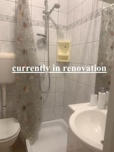 Koupelna v ubytování Casa Mare Rtina Garten Zwei Baeder EG