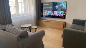 Μια τηλεόραση ή/και κέντρο ψυχαγωγίας στο Apartament Juliana