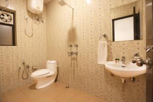 Vannituba majutusasutuses Hotel O Ravin