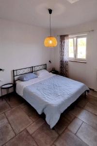 Postel nebo postele na pokoji v ubytování Apartma Lavanda + 13 fotografií
