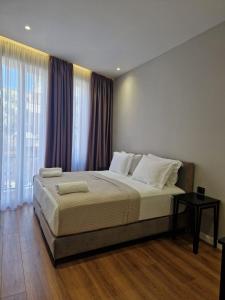 Postel nebo postele na pokoji v ubytování Santa Maria, Vila Cerloj