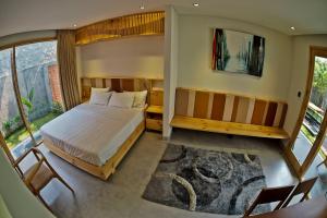 Postel nebo postele na pokoji v ubytování Carol Villa Da nang Beach 2