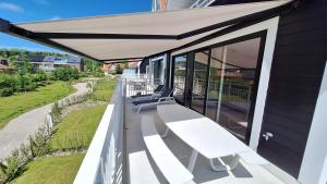 Μπαλκόνι ή βεράντα στο Boutique Appartement Sparrenduin met airco