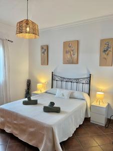 Łóżko lub łóżka w pokoju w obiekcie Casa rural Villa Miradri