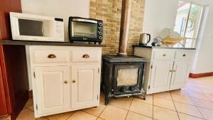 Kuchyň nebo kuchyňský kout v ubytování Patches Place