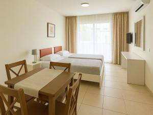 Katil atau katil-katil dalam bilik di Sechi Aparthotel Marbella - Self Service
