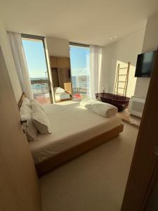 Ένα ή περισσότερα κρεβάτια σε δωμάτιο στο Solea Apartment