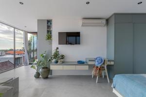 Μια τηλεόραση ή/και κέντρο ψυχαγωγίας στο Amanpuri - A place of peace