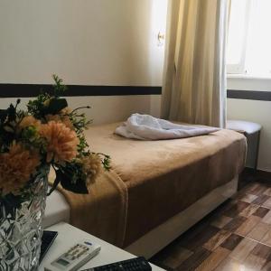 Voodi või voodid majutusasutuse Hotel velvet One toas