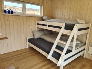 Narivoodi või narivoodid majutusasutuse Búhóll 1 Guesthouse toas