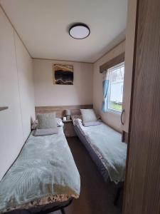 Postel nebo postele na pokoji v ubytování Seaton Sands 71 Aberlady + 11 fotografií