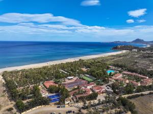 an aerial view of a resort near the beach at 4 Mori Family Village - Villaggio per Famiglie in Muravera +71 photos