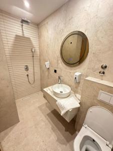Koupelna v ubytování Hotel Almanas