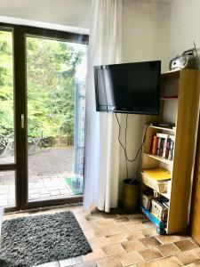 TV a/nebo společenská místnost v ubytování Saar-Mosel-Tal