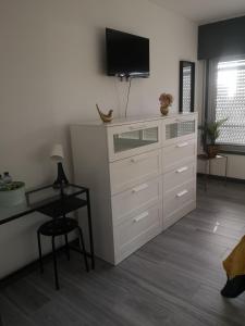 TV a/nebo společenská místnost v ubytování SunHouse Alojamentos