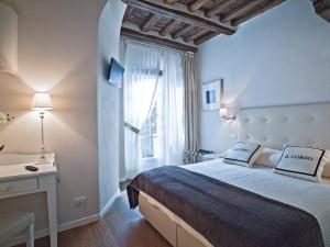 Postel nebo postele na pokoji v ubytování B&B Il Corso
