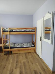 Rúm í herbergi á Hortenzie