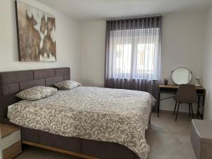 Postel nebo postele na pokoji v ubytování Apartment deluxe