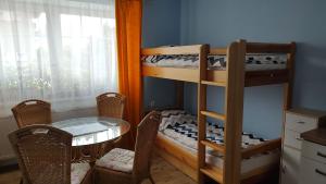 Rúm í herbergi á Hortenzie