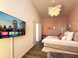 Μια τηλεόραση ή/και κέντρο ψυχαγωγίας στο Nr 5 Gemütliches Boutique-Apartment mit Flair 130 qm #Cosiness Company25