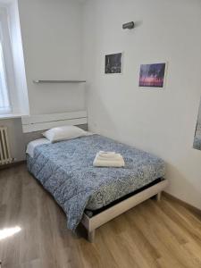 Postel nebo postele na pokoji v ubytování DA NI TO Rooms 1