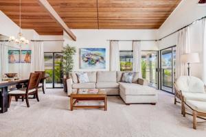 a living room with a couch and a table at Wailea Elua, #1402 in Wailea