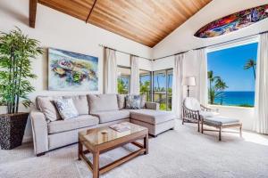 a living room with a couch and a table at Wailea Elua, #1402 in Wailea