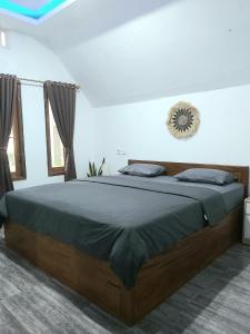 Postel nebo postele na pokoji v ubytování Stokel Cottage