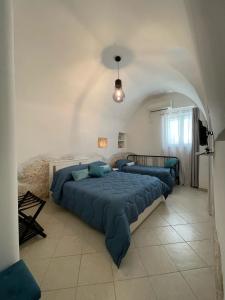 Ένα ή περισσότερα κρεβάτια σε δωμάτιο στο Casa DàStella +10 φωτογραφίες