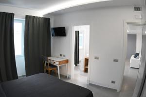 Postel nebo postele na pokoji v ubytování Golden Beach Residence