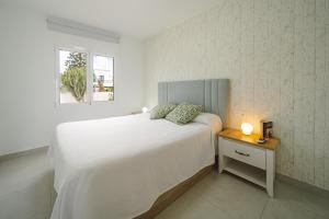 Postel nebo postele na pokoji v ubytování Apto Rebeca by HH AA, Wifi & Pool