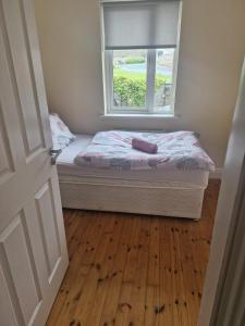 Letto o letti in una camera di Cobh Rambler