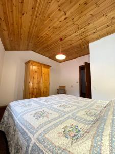 Postel nebo postele na pokoji v ubytování Simi Dolomiti