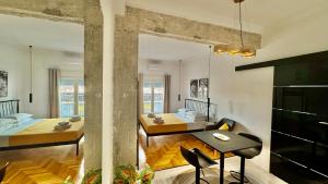 Ένα ή περισσότερα κρεβάτια σε δωμάτιο στο My Athenian Suite
