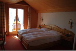 Krevet ili kreveti u jedinici u objektu Hotel Adler