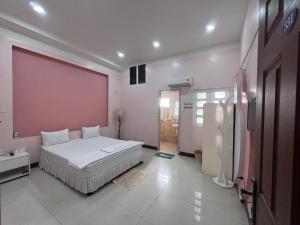 Postel nebo postele na pokoji v ubytování Hoa Mộc Trà Motel
