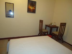 Postel nebo postele na pokoji v ubytování Guest House