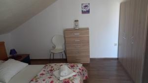 Postel nebo postele na pokoji v ubytování Apartment Inter Vivos