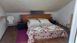 Postel nebo postele na pokoji v ubytování Apartment Inter Vivos