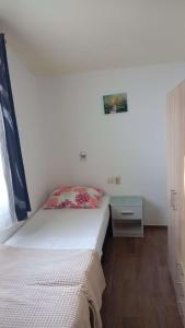 Postel nebo postele na pokoji v ubytování Apartment Inter Vivos