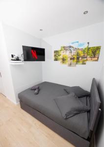 TV a/nebo společenská místnost v ubytování Le Petit Break - Strasbourg Gare - Petite France - Commerces à Proximité