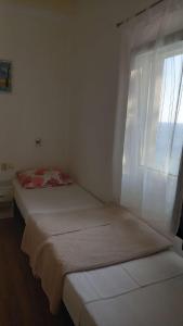 Postel nebo postele na pokoji v ubytování Apartment Inter Vivos
