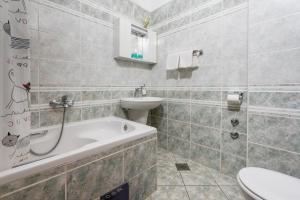 Koupelna v ubytování Apartments Obradović + 28 fotografií