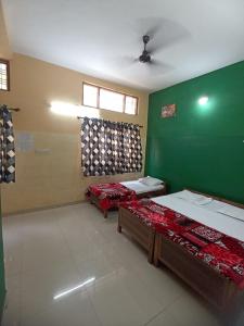 Postel nebo postele na pokoji v ubytování In boys hostel