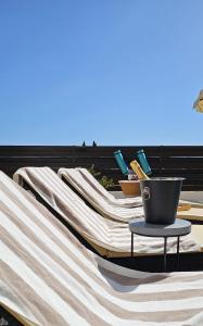 a table with a pot on top of a hammock at Villa Talya in Peyia