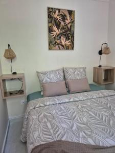 En eller flere senge i et værelse på Appartement vue mer + 7 billeder