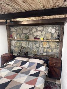 Voodi või voodid majutusasutuse Etno House Šćepanov Hlad toas